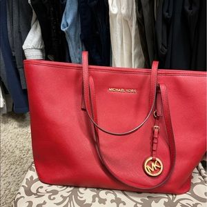 Michael Kors red tote bag
